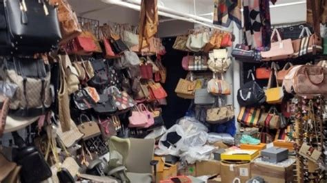 fake shoe bust|2 arrested in largest counterfeit goods seizure in US history  .